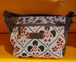 Sac bandoulière poil de vachettes, cuir et coton 40,00 €