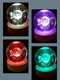 Sphère en verre avec socle en bois et lumière changeante